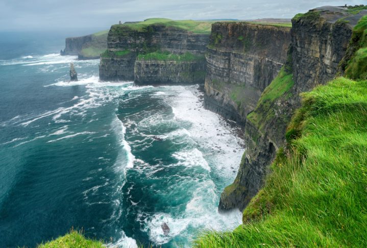 Spectacular view of famous Cliffs of Moher and wild Atlantic Ocean, County Clare, Ireland.