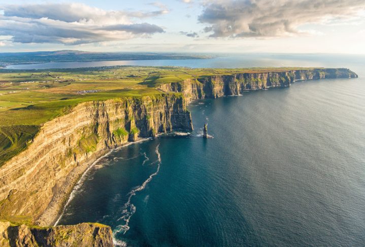 Aerial birds eye drone view from the world famous cliffs of moher in county clare ireland. Scenic Irish rural countryside nature along the wild atlantic way.