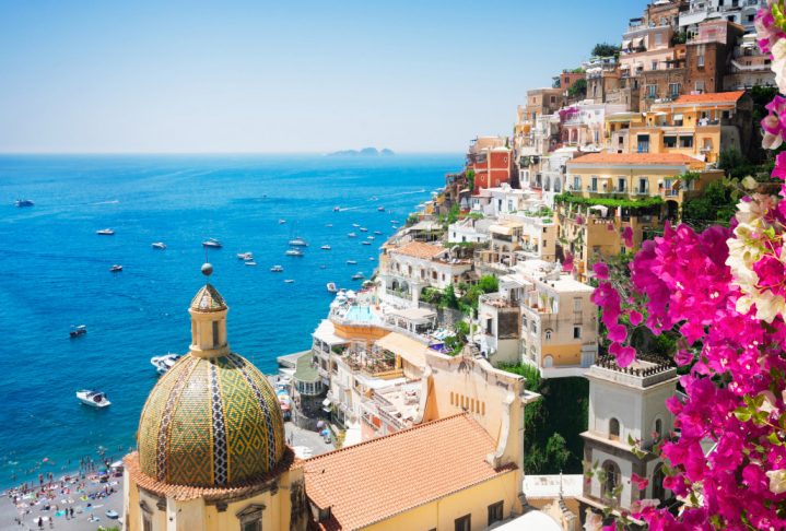 view of Positano with flowers - famous old italian resort, Italy