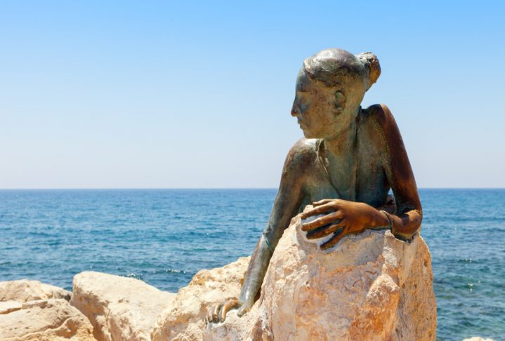 PAPHOS, CYPRUS - July 24, 2019: "Sol Alter", Bronze statue of the young goddess of love Aphrodite. Sculptor Yiota Ioannidou